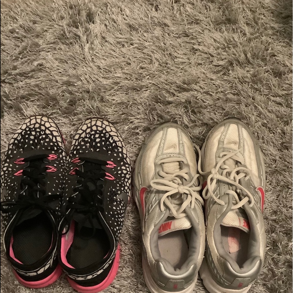 2 pairs of nike shoes
